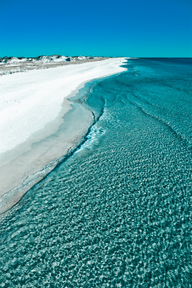 White sand beach and turquoise Gulf of Mexico waters near Ocean Villa