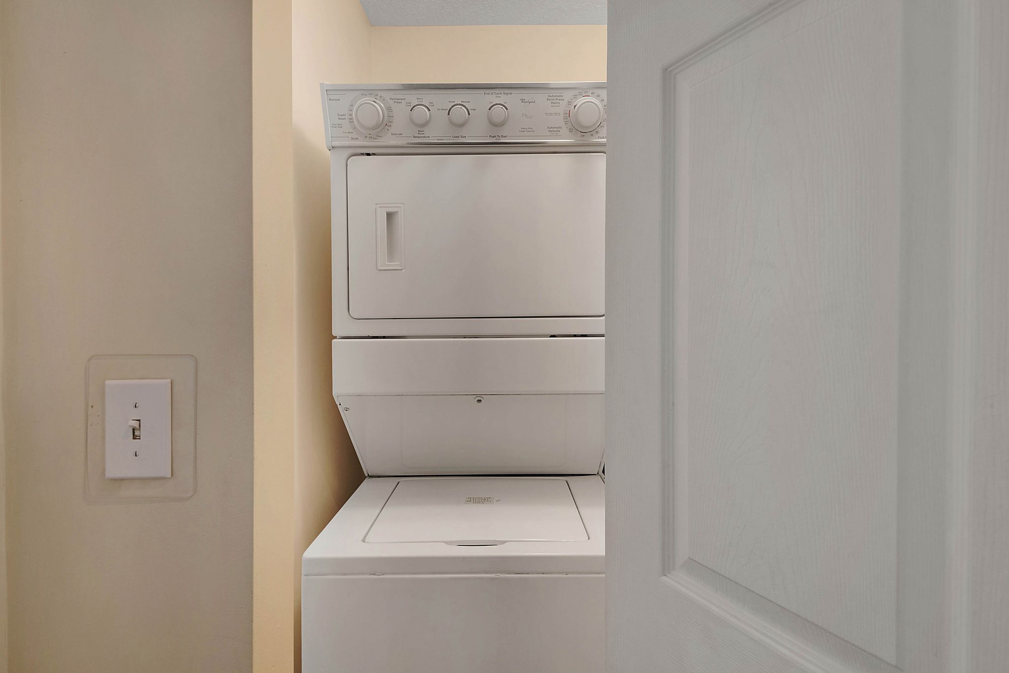Full-size washer and dryer in the condo laundry room